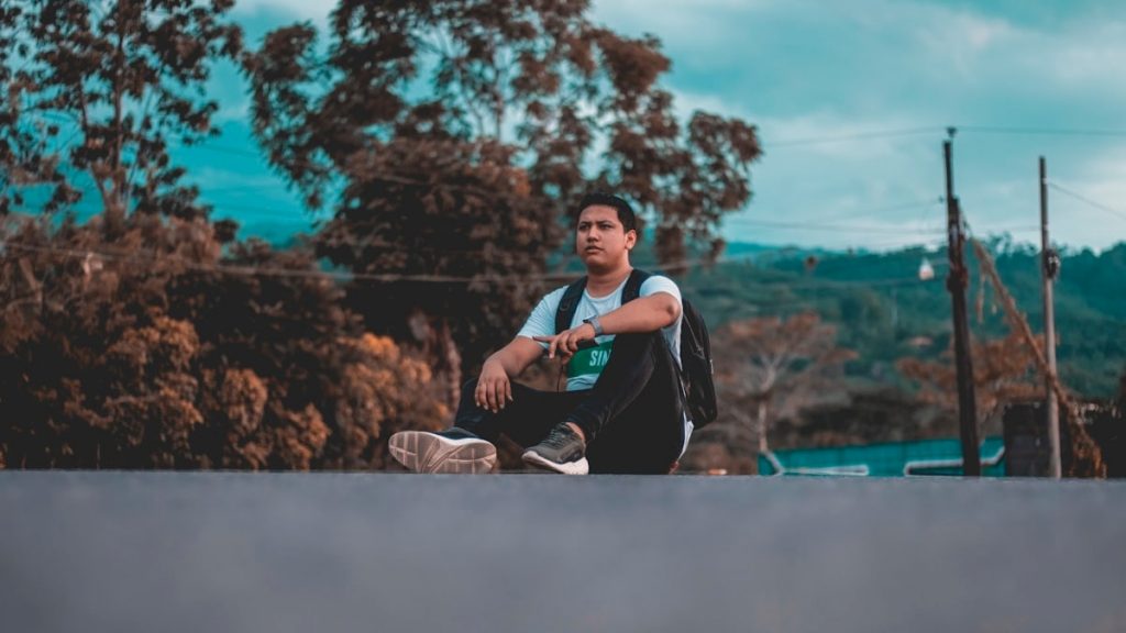man near trees